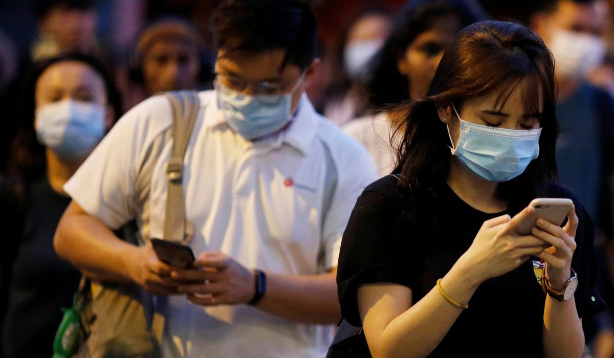 People wear face masks